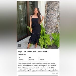 Black high low eyelet midi dress